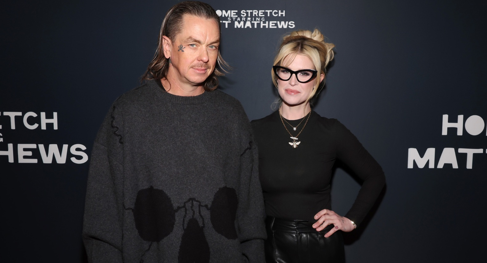 Kelly Osbourne y Sid Wilson DJ de Slipknot en un evento público